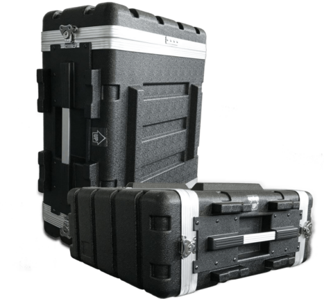 Two black hard plastic equipment cases with metal-reinforced edges, latches, and handles, one standing upright and the other lying flat against a black background.